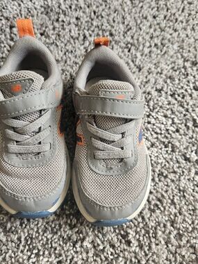New Balance Kids Gray Mesh Sneakers with Orange Pull Tabs